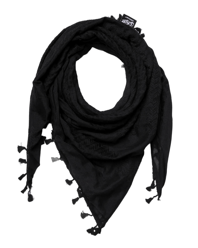 Pure black Hirbawi Kufiya keffiyeh with traditional pattern, showcasing the classic design and high-quality fabric by KUFIYA®.