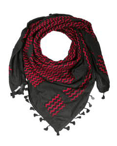 KUFIYA® Um Suleiman Kufiya, traditional black and white keffiyeh with intricate pattern, worn as cultural headwear.