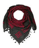 KUFIYA® Um Suleiman Kufiya, traditional black and white keffiyeh with intricate pattern, worn as cultural headwear.